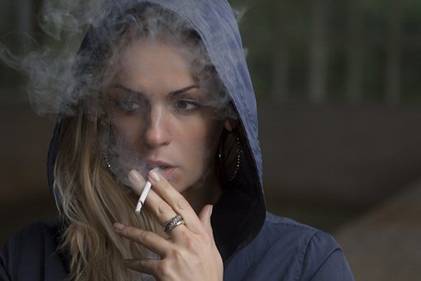 https://pixabay.com/photos/woman-smoking-cigarette-tobacco-918616/  Credit: Free-Photos